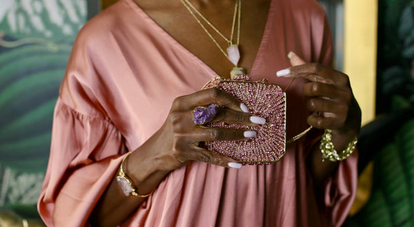 This remarkable ring is crafted in 22k gold brass and features natural amethyst with an adjustable ring.