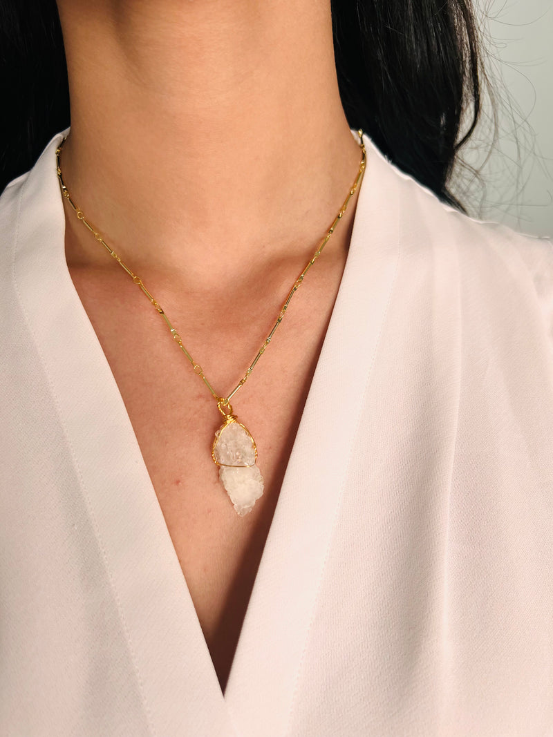 Beautiful 18K gold plated chain and raw moonstone pendant necklace exquisitely designed with passion.   Product Details  Composition: Raw Moonstone, 18k gold-plated brass Handmade in Morocco Please note the possibility of natural inclusions in gemstones